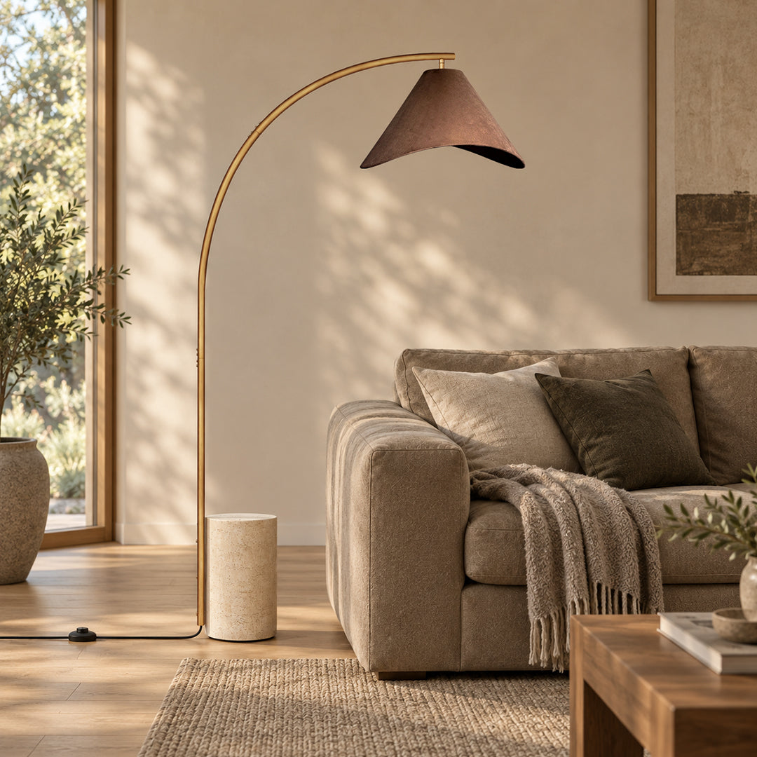 Bentra floor lamp beside a sofa in daylight