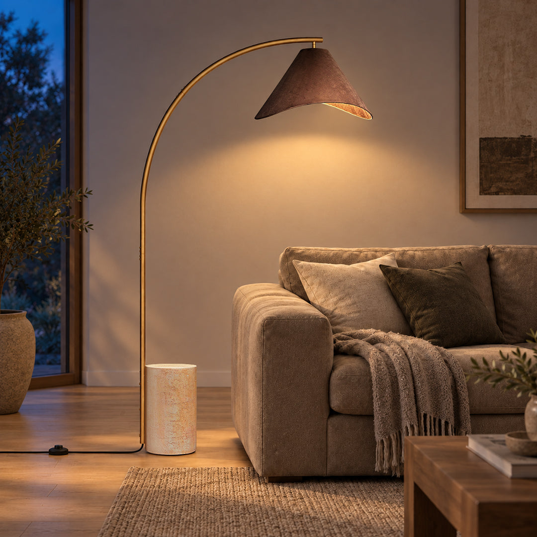 Bentra floor lamp beside a sofa at night